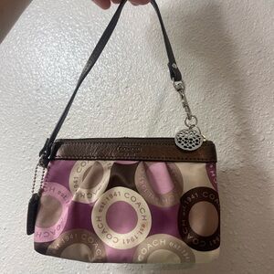 Authentic Coach pink and brown multi color wristlet bag